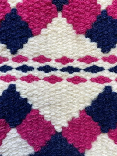 les grains de point de tapisserie